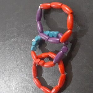 🌹 Red, blue and purple wooden bracelets.